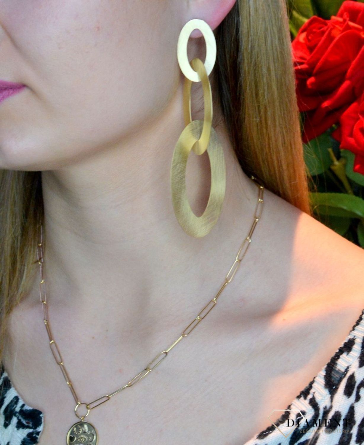 Srebrne kolczyki duże owalne w pozłoceniu OR AQ H0460304. Idealny pomysł na prezent. Kolczyki wykonane z najwyższej jakości srebra próby 925. Idealne kolczyki na uroczystość. Długość całkowita 11 cm..jpg